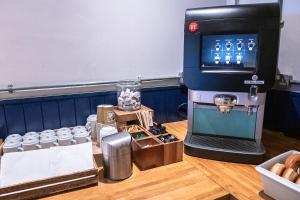 TV a/nebo společenská místnost v ubytování Castlefield Hotel