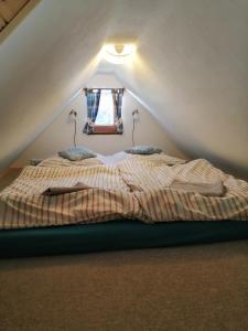 Postel nebo postele na pokoji v ubytování Apartmán Dvě Micky + 12 fotografií