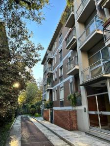 an empty street in front of a building at STUDIO 47 - CITY LIFE in Milan