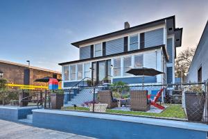 a house with a playground in front of it at Historic Renovated Home Less Than 2 Mi to Beach and Pier! in Daytona Beach