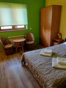Posteľ alebo postele v izbe v ubytovaní Widok