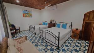 Boutique Hotel Secret Garden Granada客房内的一张或多张床位