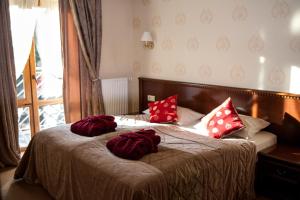 Postel nebo postele na pokoji v ubytování Romantik Spa Hotel