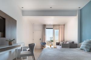 Voodi või voodid majutusasutuse Kassandra Bay Resort, Suites & Spa toas