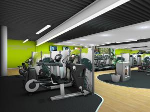 a gym with treadmills and elliptical machines at University of Exeter - Pennsylvania Court in Exeter