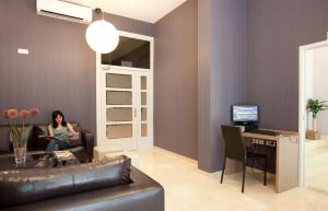 TV a/nebo společenská místnost v ubytování Hostal Centric