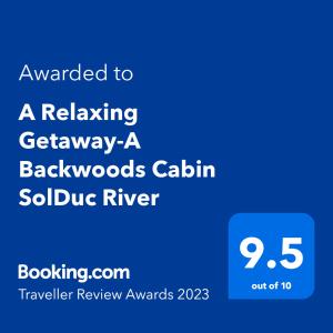 Ett certifikat, pris eller annat dokument som visas upp på A Relaxing Getaway-A Backwoods Cabin SolDuc River