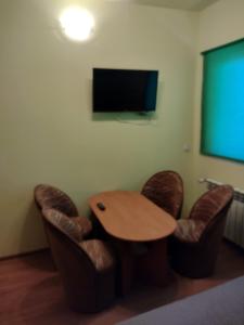 Televízia a/alebo spoločenská miestnosť v ubytovaní Widok