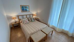 A bed or beds in a room at Daro 3D 46
