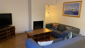 A television and/or entertainment centre at Daro 3D 46