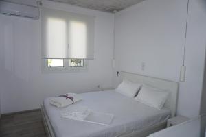 Postel nebo postele na pokoji v ubytování Modern Apartment 10mins from the Beach