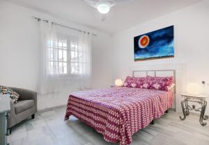 Ένα ή περισσότερα κρεβάτια σε δωμάτιο στο Los Flamencos Manilva apartment +15 φωτογραφίες