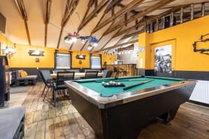 a billiard room with a pool table in it at Keletiparty in Hajdúszoboszló