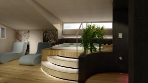 a bedroom with a bed with a window at Hotel Villa Eugenia - 3 Stelle Superior con Private SPA e Piscina in Lido di Jesolo
