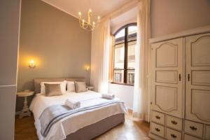 Posteľ alebo postele v izbe v ubytovaní B&B Dimora Sassetti 6