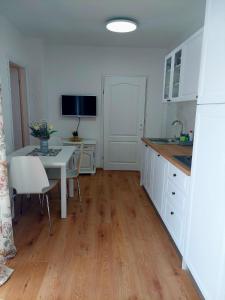 Kuchyň nebo kuchyňský kout v ubytování Seaside apartments