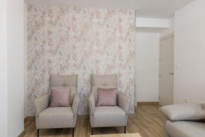 A seating area at Neptuno Deluxe