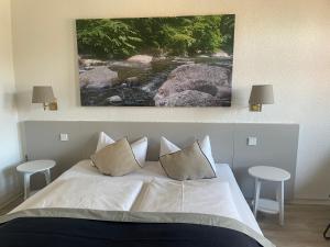 Postel nebo postele na pokoji v ubytování Harzhotel Warnstedter Krug