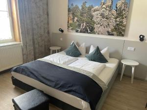 Postel nebo postele na pokoji v ubytování Harzhotel Warnstedter Krug