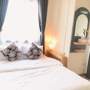 Postel nebo postele na pokoji v ubytování Teenan Hostel