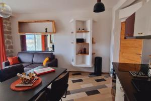 Eldhús eða eldhúskrókur á Magnifique appartement avec balcon vue mer à l'entrée d'Ajaccio