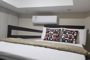 Ένα ή περισσότερα κρεβάτια σε δωμάτιο στο Salinas Beach, 7F Luxury Dept in Resort Aquamira