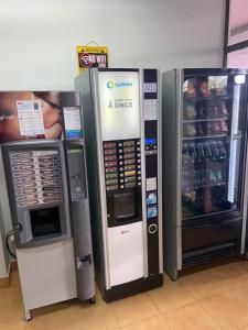 two vending machines are next to each other at MARIACAST CLUBE DA PRAIA DA ROCHA in Portimão