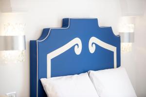 Кровать или кровати в номере CASA DONNA LINDA