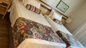 Cama o camas de una habitación en Flat Particular Hotel Lets Idea - SEM CAFÉ