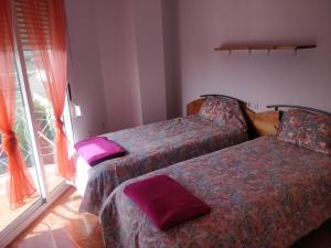 Postel nebo postele na pokoji v ubytování LA CASA AZUL de Anna