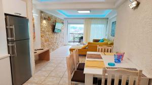 Posezení v ubytování Anastasia Luxury Suites by Xenius Zeus in Nea Flogita