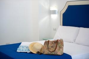 Кровать или кровати в номере CASA DONNA LINDA