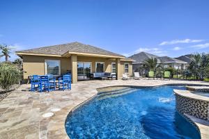 a home with a swimming pool and a house at Laguna Vista Resort-Style Home, Private Pool and Spa in Laguna Vista