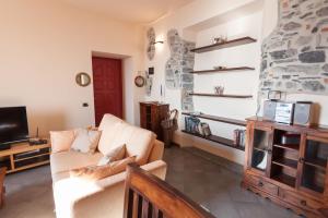 Μια τηλεόραση ή/και κέντρο ψυχαγωγίας στο Menaggio Marina by LoveComo