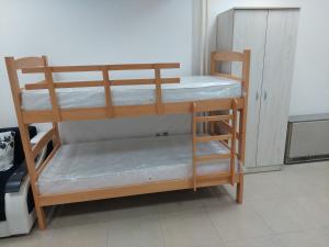 Postel nebo postele na pokoji v ubytování Apartman Aleksić u samom centru grada