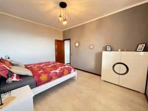 A bed or beds in a room at Casa Vista Pájaro