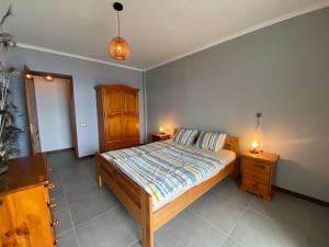 A bed or beds in a room at Casa Vista Pájaro