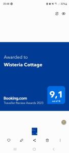 una captura de pantalla del sitio web para un wyss en Wisteria Cottage, en Fleurines