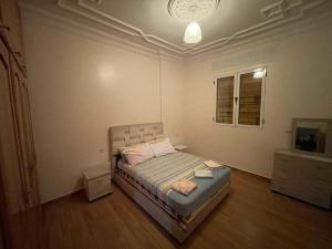 Postel nebo postele na pokoji v ubytování Appartement à louer