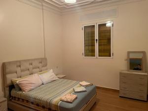 Postel nebo postele na pokoji v ubytování Appartement à louer