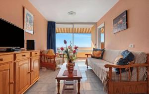 Μια τηλεόραση ή/και κέντρο ψυχαγωγίας στο Apartamento en Los Gigantes, Tenerife