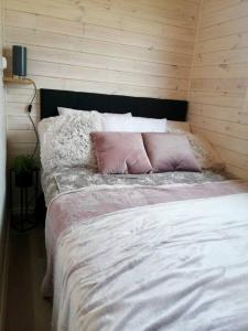 Postel nebo postele na pokoji v ubytování Tiny beach house heated and airconditioned