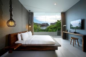 Postel nebo postele na pokoji v ubytování Sandhya Villa Canggu Echo Beach + 79 fotografií