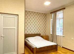 Letto o letti in una camera di Green Corner