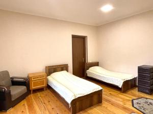 Letto o letti in una camera di Green Corner