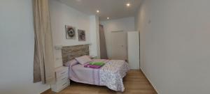 Posteľ alebo postele v izbe v ubytovaní La casita de Margo 1