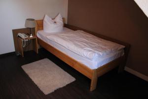 Postel nebo postele na pokoji v ubytování Osterberg - Restaurant und Hotel