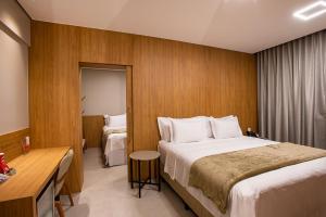 Amazon Aeroporto Hotel客房内的一张或多张床位