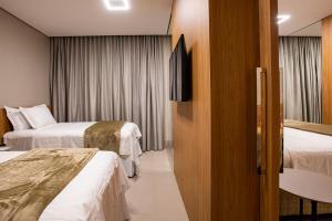 Amazon Aeroporto Hotel客房内的一张或多张床位