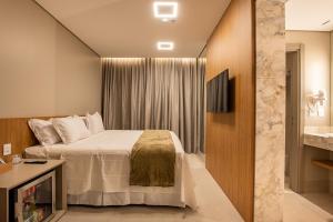 Amazon Aeroporto Hotel客房内的一张或多张床位